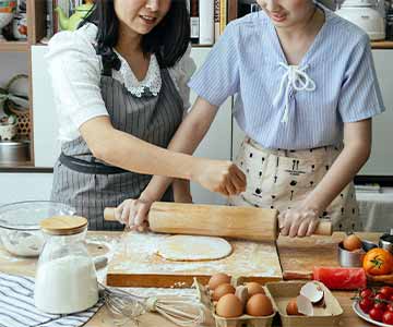 Couple Making a Pie Crust for Pie Day