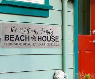 Custom Titanium Sign On The Side Of The Family Beach Home.