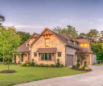 Warm dusk light on a modern rustic home.