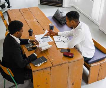 Two men working at a small business