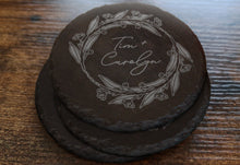 Custom Engraved Granite Coasters On Wood Table.