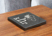 Housewarming Gifts Featuring Custom Engraved Granite Coaster On Coffee Table