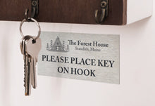 Custom Stainless Steel Label For Instructions On Wall Beneath Key Holder.