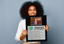 Personalized Perpetual Frame Plaque For Associate Of The Month Held By Excited Woman.