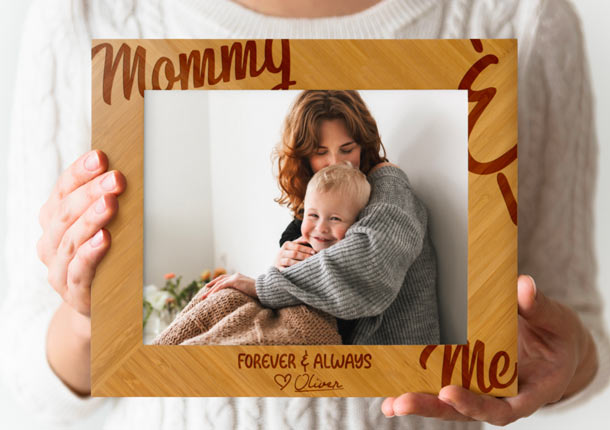 Engraved Custom Wood Picture Frame Held By Woman.