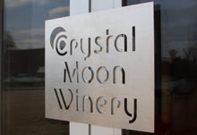 Custom Cut Stainless Steel Metal Stencil Hanging On Business Window.