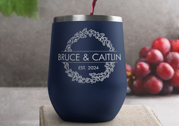 Custom Engraved Navy Blue Wine Tumbler Near Grapes.