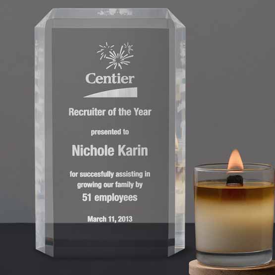 Custom Acrylic Award For Recruiter Of The Year With Logo And Name And Faceted Clipped Corners On Shelf With Candle