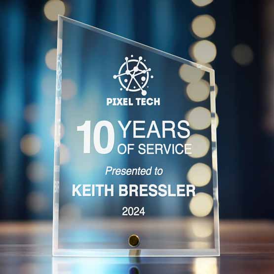 Custom Peak Shaped Economy Glass Award For Years Of Service With Logo And Name And Date Standing Via Gold Pin On Table