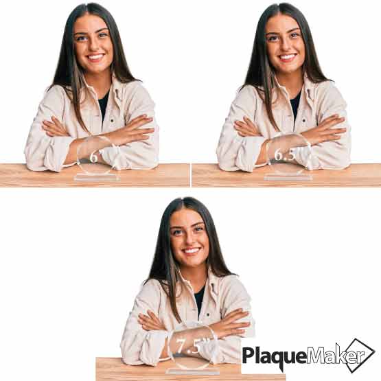 Size Guide With Happy Woman Sitting Behind Three Different Sizes Of Custom Faceted Octagon Glass Award With Glass Base