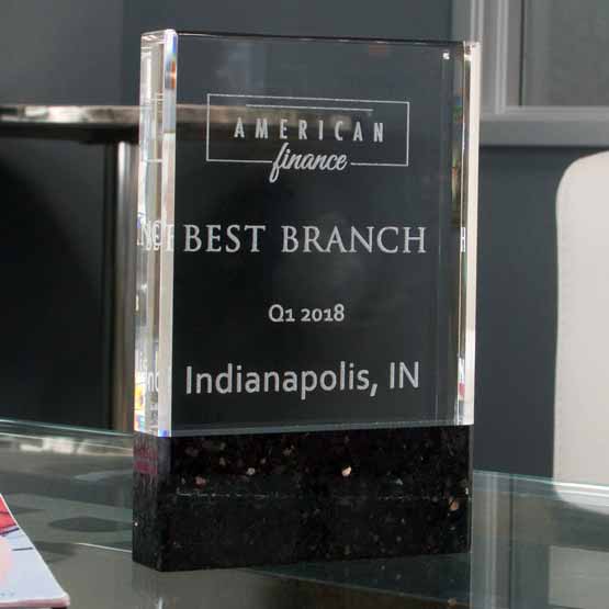 Custom Rectangle Glass Award For Best Financial Branch With Black Marble Base On Glass Work Table With Office Chair