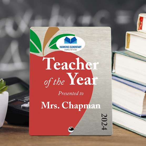 Custom Printed Stainless Steel Award in the Rounded Rectangle Shape on Teacher Desk