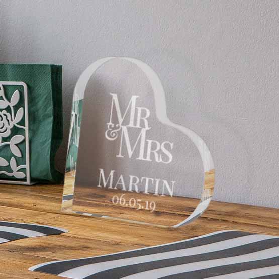 Custom Heart Shaped Acrylic Keepsake With Mister And Missus Text And Name And Date On Wood Shelf With Napkin Holder