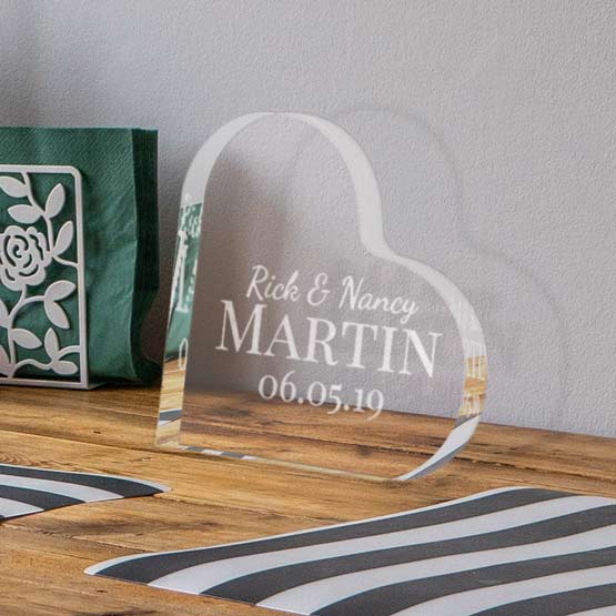 Custom Heart Shaped Acrylic Keepsake With Couple Names And Family Name And Date On Wood Shelf With Napkin Holder
