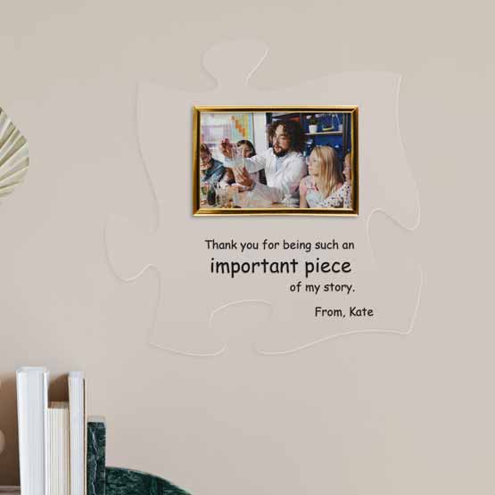 Custom Clear Acrylic Puzzle Piece Sign With Gold Picture Frame And Teacher With Student Photo And Thank You Message On Wall