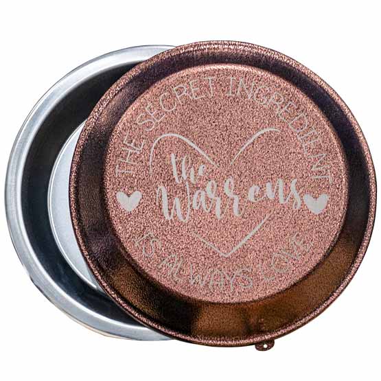Custom Nine Inch Aluminum Pie Pan With Copper Lid Featuring Name And Secret Ingredient Is Love Text Against White Background