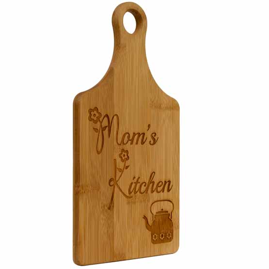 Custom Paddle Shaped Bamboo Cutting Board Laser Engraved With Teapot Artwork And Mom’s Kitchen Text