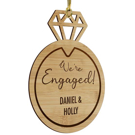 Custom Engagement Ring Shaped Bamboo Ornament With Gold String And Laser Engraved With We’re Engaged Text And Couple Names