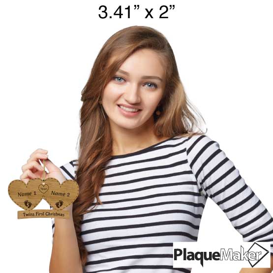 Size Guide With Happy Woman Holding Custom Pair Of Hearts Bamboo Ornament Engraved With Twins First Christmas Via Gold String