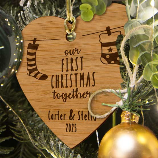 Custom Heart Shaped Bamboo Ornament Engraved With Couple Names And First Christmas Text And Stocking Art On A Christmas Tree
