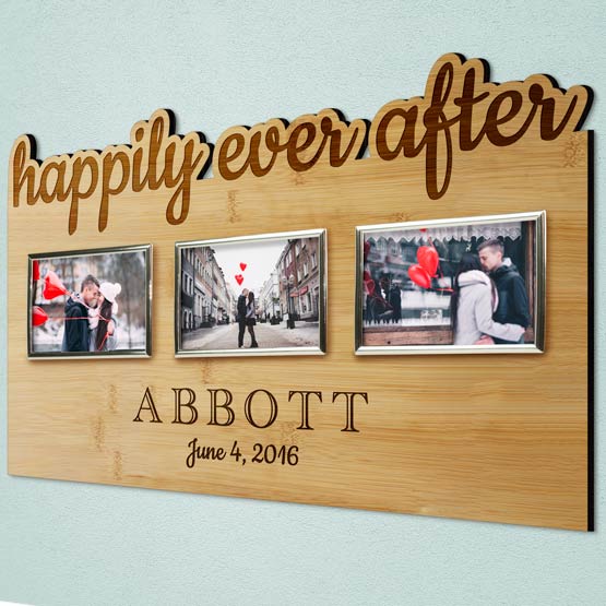 Custom Bamboo Sign With Three Couple Photos In Picture Frames And Engraved With Happily Ever After And Names Hanging On Wall