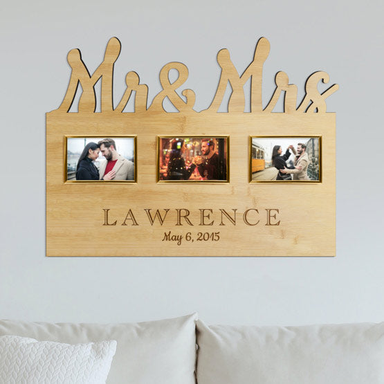 Custom Bamboo Sign With Married Titles Cutout And Three Picture Frames And Engraved With Name And Date On A Wall Over Couch
