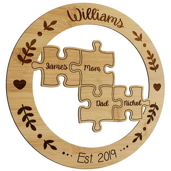 Custom Bamboo Sign With Puzzle Pieces Cutout Inside A Circle And Laser Engraved With Family Names And Hearts And Wheat Art