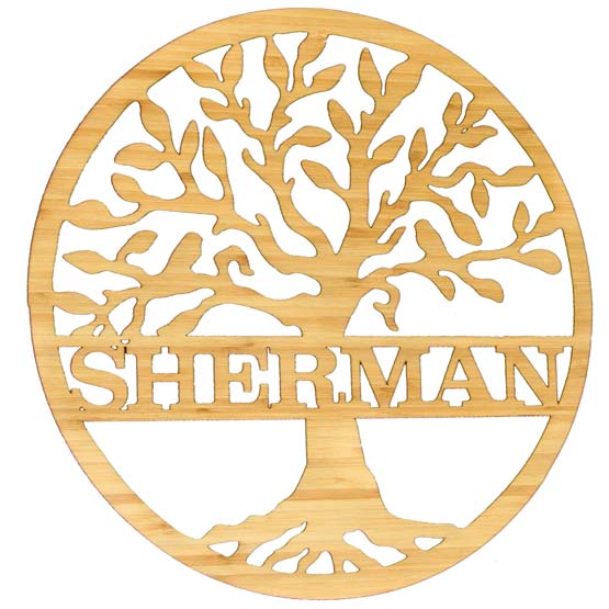 Custom Circle Bamboo Sign With Detailed Cutout Of Tree And Family Name Set Against A White Background