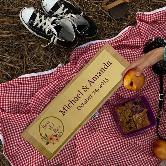 Custom Bamboo Wine Box With Gold Aluminum Plate Featuring Couple Names And Date And Sample Logo On Picnic Blanket Outside