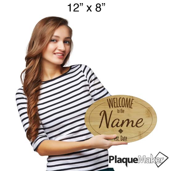 Size Guide With Happy Woman Holding Oval Shaped Bamboo Sign Laser Engraved With Welcome Text And Showing Customizable Areas