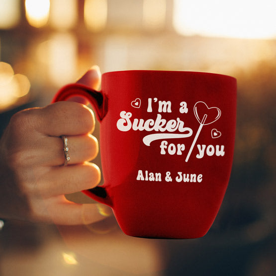 Woman Hand Holding Custom Red Ceramic Bistro Mug Laser Engraved With I’m A Sucker For You And Lollipop Art And Couple Names