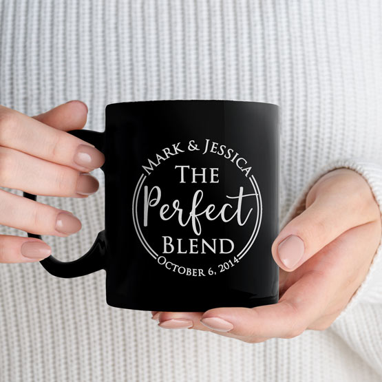 Woman Hands Holding Custom Black Coffee Mug Laser Engraved With Couple Names And The Perfect Blend And Date