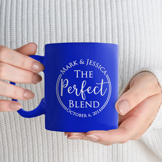 Woman Hands Holding Custom Blue Coffee Mug Laser Engraved With Couple Names And The Perfect Blend Text And Date