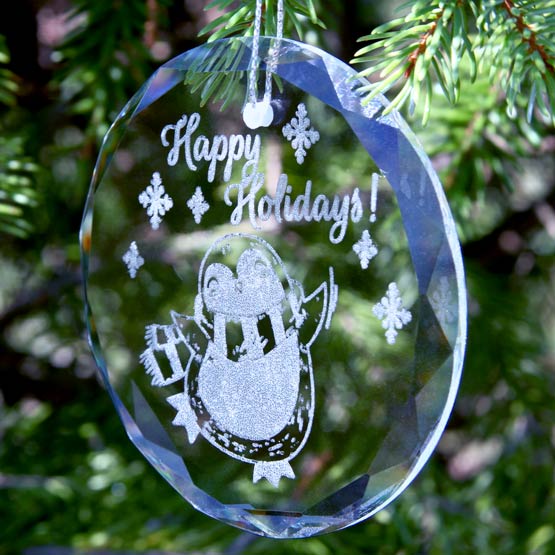 Custom Circle Glass Ornament Engraved With Happy Holidays Message And Penguin Art Hanging On Christmas Tree