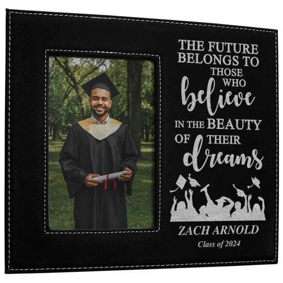 Custom Black Faux Leather Picture Frame With Graduation Message And Details And Photo Of Grad Student Holding Diploma