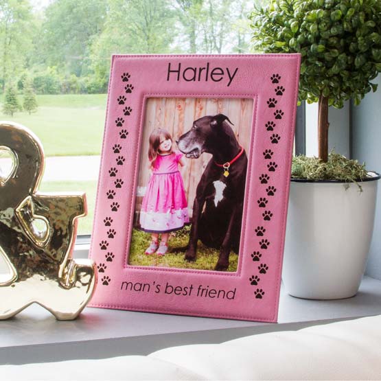 Pink Faux Leather Picture Frame With Photo Of Girl And Dog And Engraved With Name And Man’s Best Friend On A Window Sill
