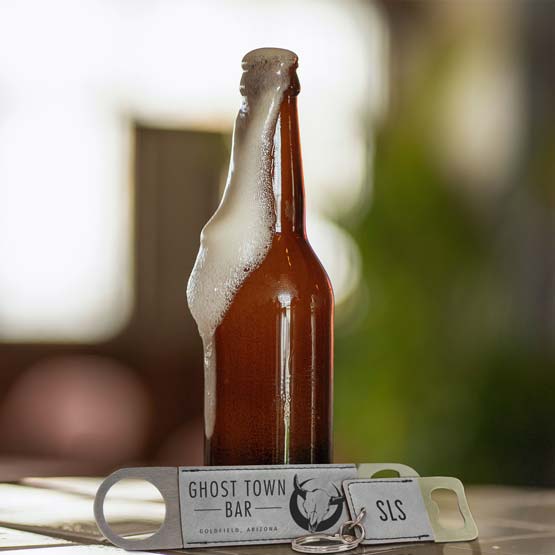 Set Of Custom Gray Faux Leather Bottle Opener Engraved With Ghost Town Bar And A Small Keychain Bottle Opener Near Beer