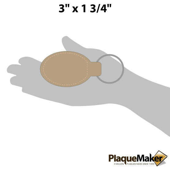 Size Guide With Blank Hand Holding Custom Light Brown Faux Leather Oval Keychain Against A White Background