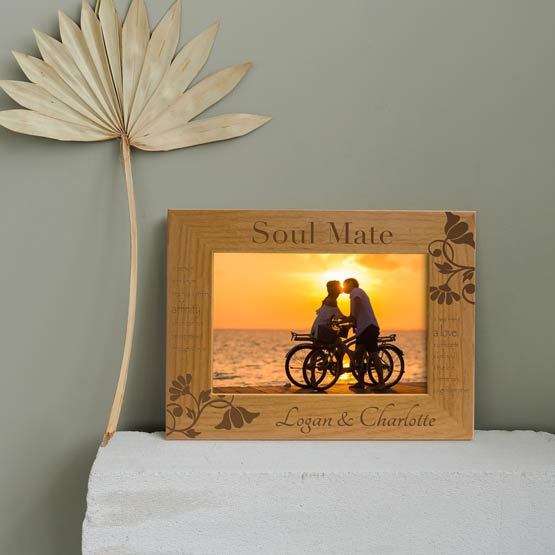 Red Alder Picture Frame With Photo Of Couple At Beach And Soul Mate Message And Flower Art On White Stand With Dried Leaf