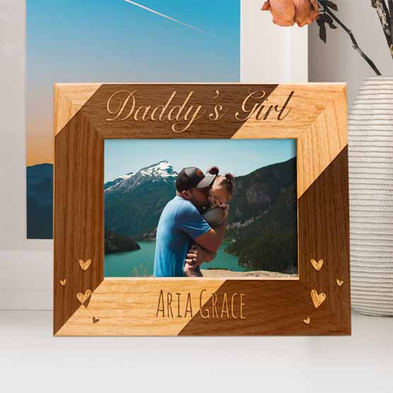 Red Alder Picture Frame With Dad And Girl Photo And Engraved With Daddy’s Girl And Name And Hearts On Shelf With Flowers