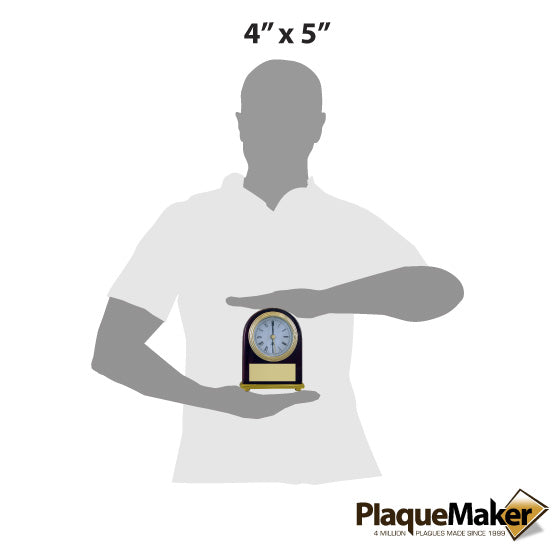Size Guide With Blank Figure Holding Rosewood Portrait Desk Clock With Gold Trim And Metal Plate Against A White Background