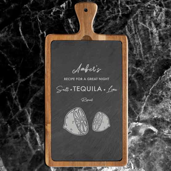 Rectangle Slate Sign Printed With Tequila Message And Lime Art Inside Cutting Board Style Acacia Paddle On Marble Counter