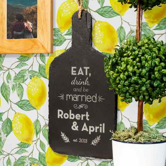 Custom Paddle Board Shaped Slate Sign With Rope And Printed With Marriage Message And Names And Date On Wall With Lemon Art