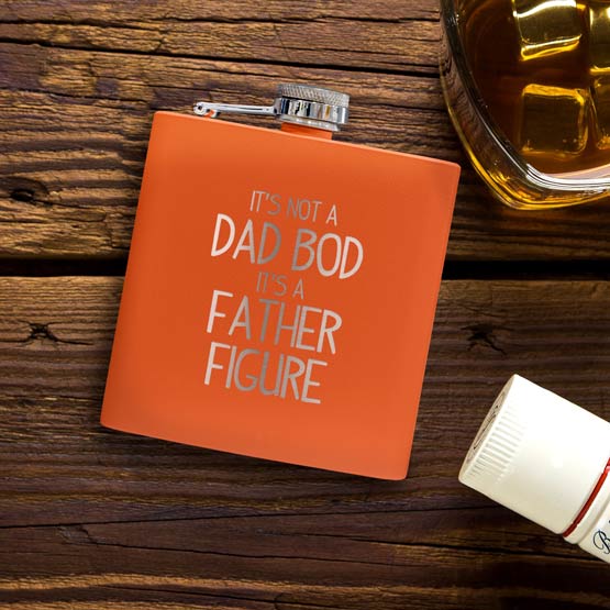 Orange Powder Coated Stainless Steel Flask Laser Engraved With It’s Not A Dad Bod It’s A Father Figure On Wood Table