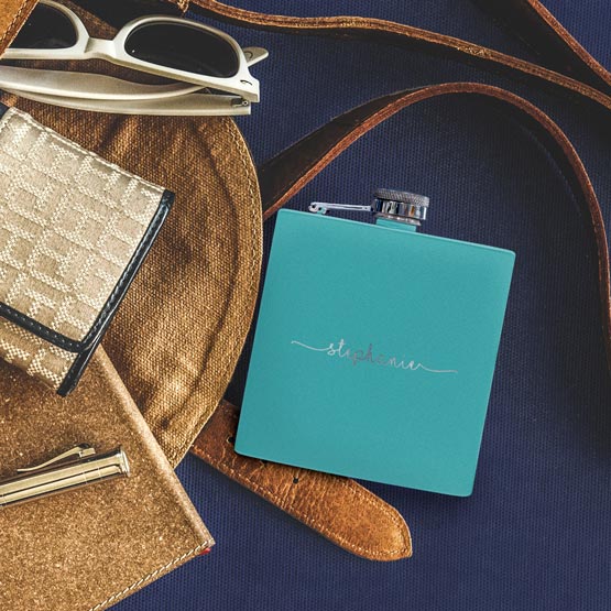 Custom Teal Powder Coated Stainless Steel Flask Engraved With Stephanie On Blue Chair With Bag And Sunglasses