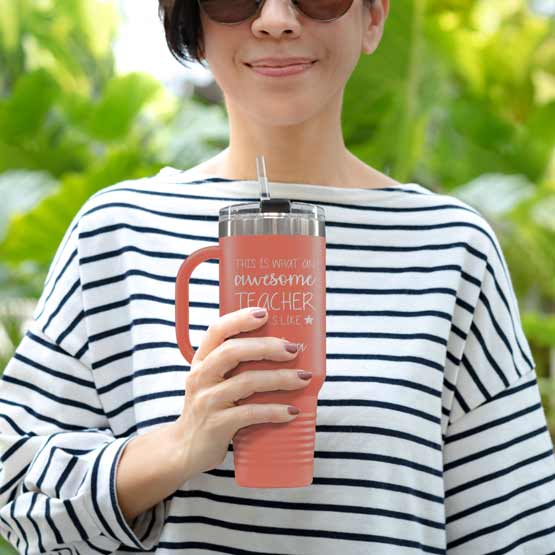 Happy Woman Outdoors Holding Custom Coral Stainless Steel Coffee Tumbler With Handle And Straw And Teacher Message