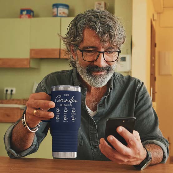 Old Man Holding Phone And Blue 20 Ounce Tumbler With Handle And This Grandpa Is Loved By Text And Names And Handprints