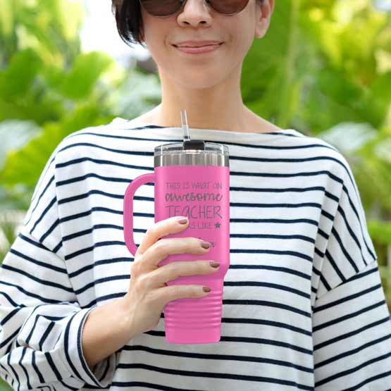 Happy Woman Outdoors Holding Custom Pink Stainless Steel Coffee Tumbler With Handle And Straw And Teacher Message