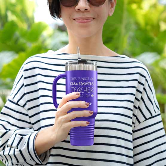 Happy Woman Outdoors Holding Custom Purple Stainless Steel Coffee Tumbler With Handle And Straw And Teacher Message