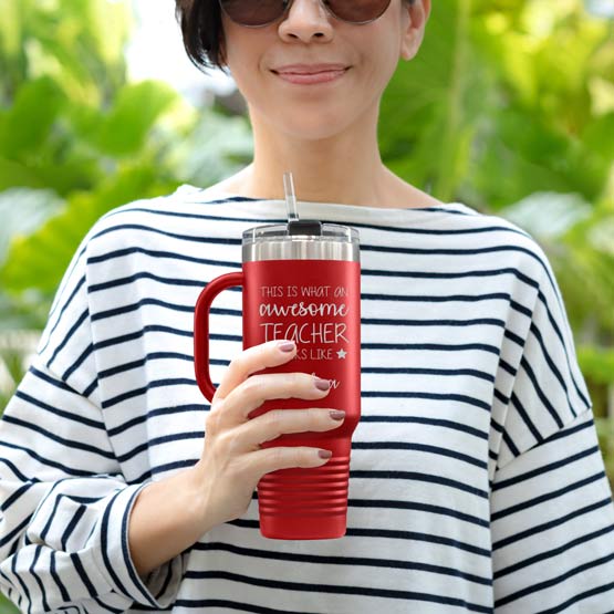 Happy Woman Outdoors Holding Custom Red Stainless Steel Coffee Tumbler With Handle And Straw And Teacher Message